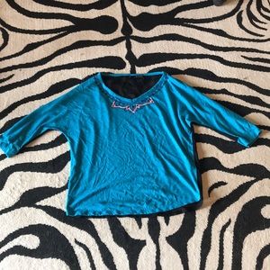 Blue jewel tone blouse with chiffon back